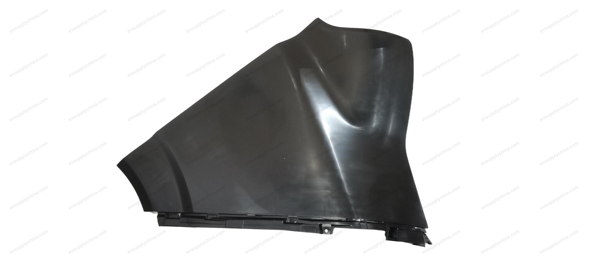 The upper left side of the rear bumper