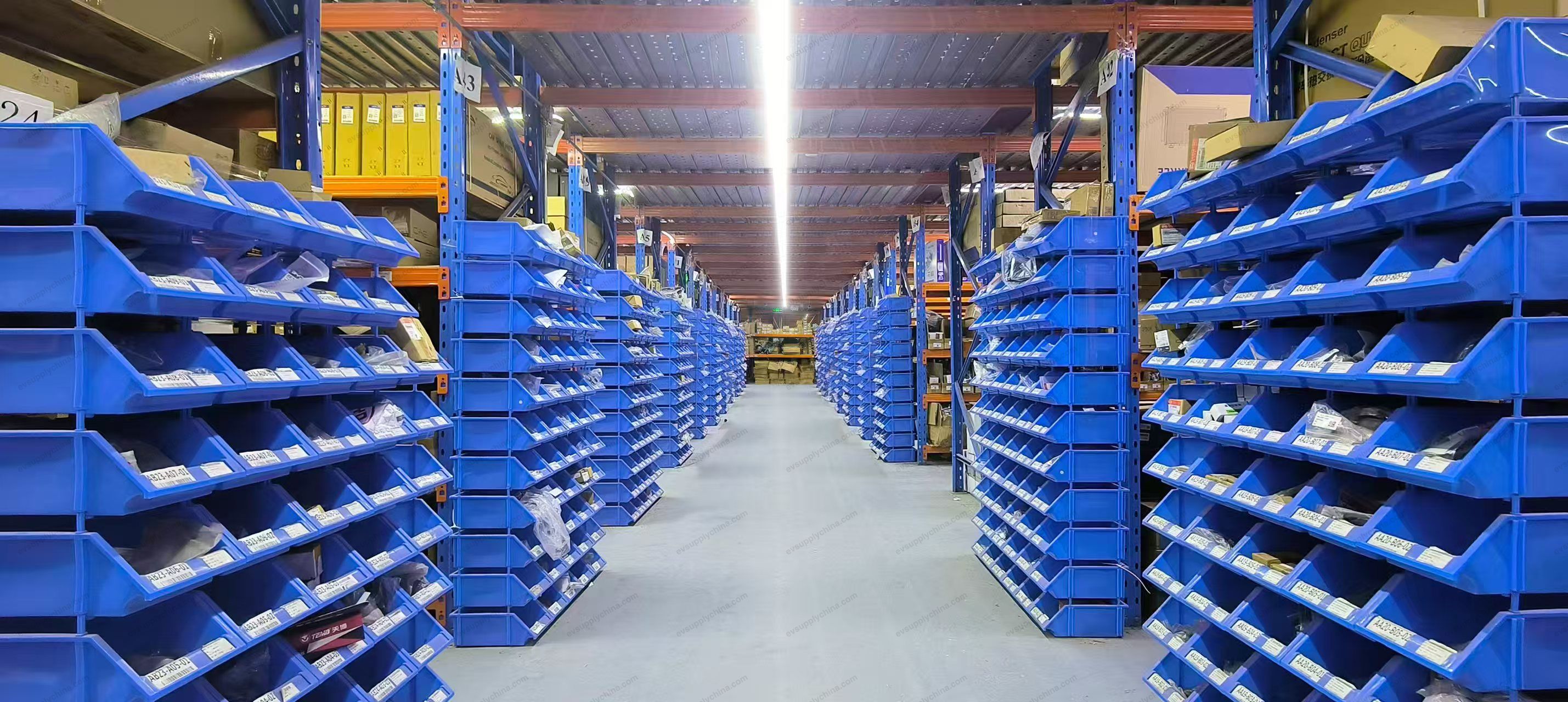 Inside our parts warehouse — labeled bins organized by OE code